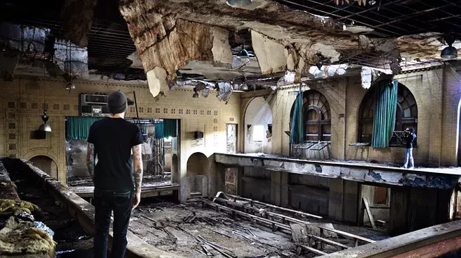 Seph Lawless examines a typical Detroit ruin.