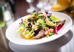 Yum Neau, sliced barbecue beef with carrot, cucumber, onion, mixed greens, tomato, celery, green onion and lime juice, from Mai’s Authentic Thai Cuisine in Warren. - ROBERT WIDDIS